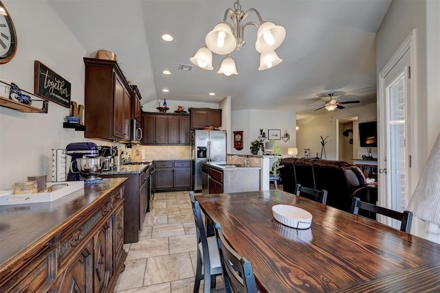 dining space with recessed lighting, ceiling fan with notable chandelier, and visible vents