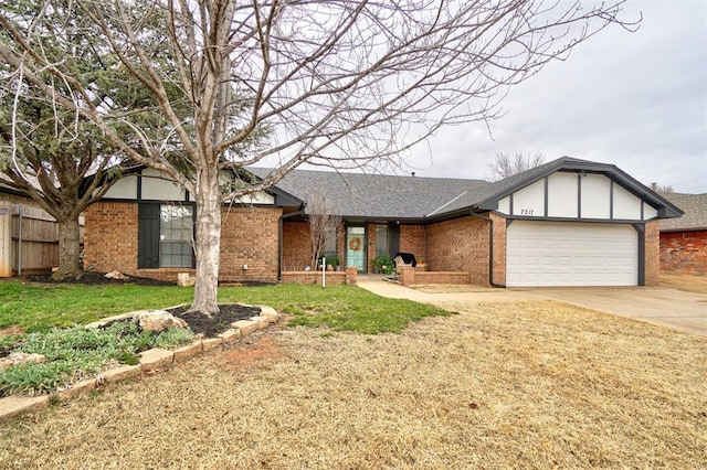 ranch-style house featuring an attached garage, brick siding, and driveway