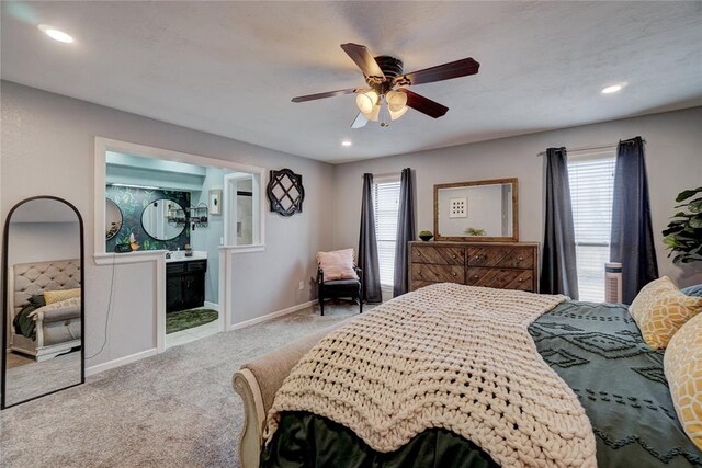 bedroom featuring a ceiling fan, ensuite bath, recessed lighting, carpet floors, and baseboards