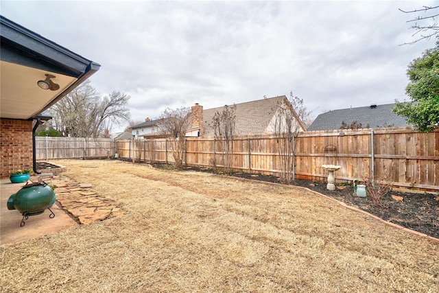 view of yard featuring a fenced backyard