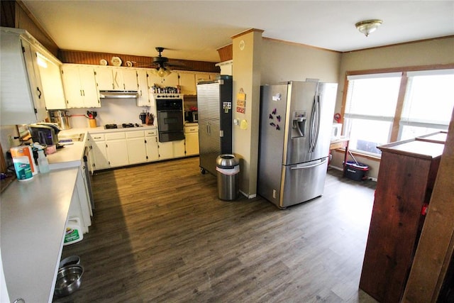 kitchen with dark wood-style floors, light countertops, black gas cooktop, stainless steel refrigerator with ice dispenser, and under cabinet range hood