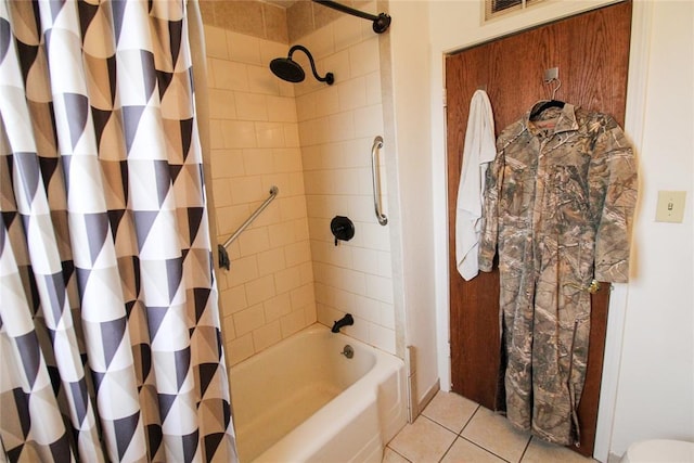 full bathroom featuring tile patterned floors, visible vents, and shower / bathtub combination with curtain