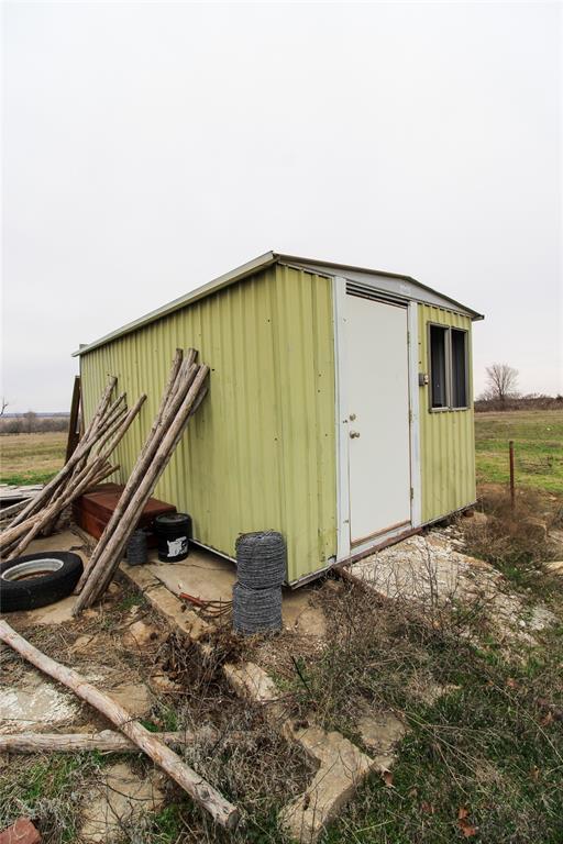 view of outbuilding with an outdoor structure