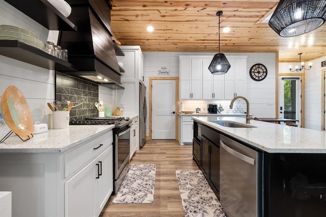 kitchen featuring wooden ceiling, appliances with stainless steel finishes, light wood-type flooring, open shelves, and a sink