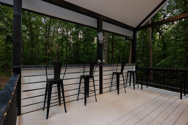 wooden deck featuring outdoor dry bar