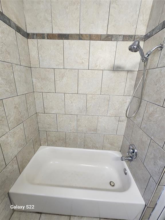 full bathroom with shower / tub combination