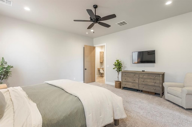 bedroom with recessed lighting, visible vents, and light colored carpet