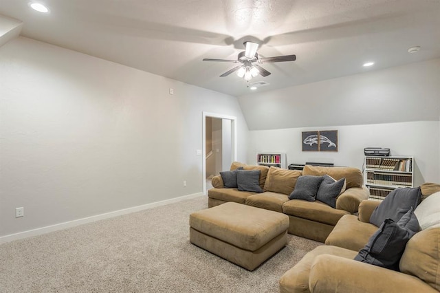 cinema room featuring lofted ceiling, a ceiling fan, recessed lighting, carpet flooring, and baseboards