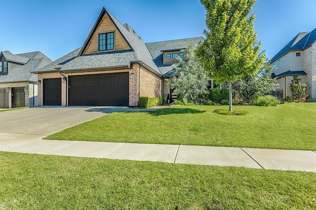 1401 Regency Bridge Cir, Edmond, OK 73034 - view of front facade featuring brick siding, a front lawn, concrete driveway, a shingled roof, and a garage