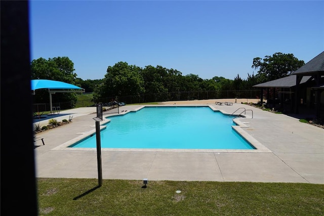 1401 Regency Bridge Cir, Edmond, OK 73034 - view of swimming pool featuring a patio