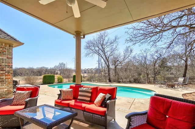 outdoor pool featuring outdoor dining space, a patio, fence, ceiling fan, and an outdoor hangout area