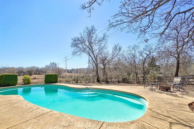 view of pool featuring a fenced in pool and a patio