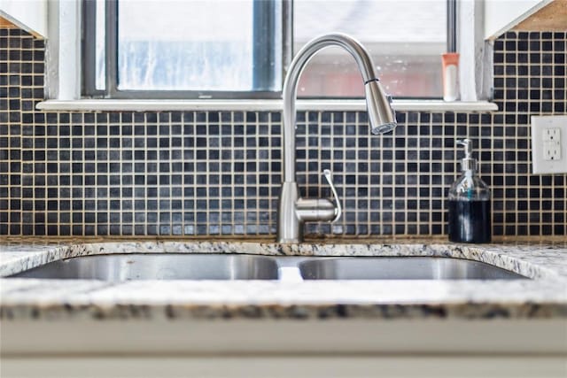 interior details featuring a sink