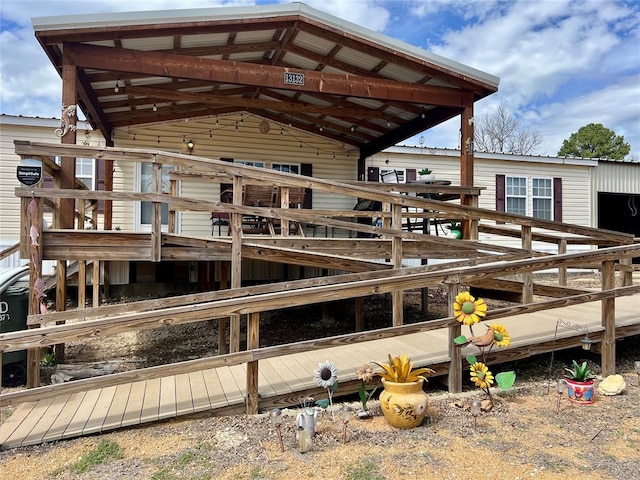 exterior space with a carport