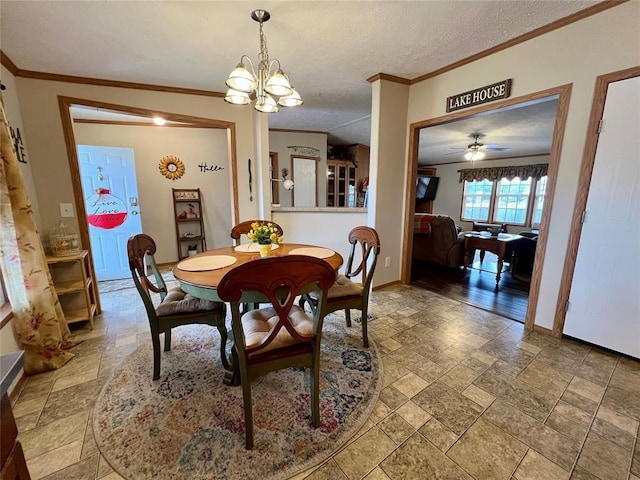 13132 Bluebird Ln, Kingston, OK 73439 - dining space with baseboards, stone finish floor, a textured ceiling, crown molding, and ceiling fan with notable chandelier