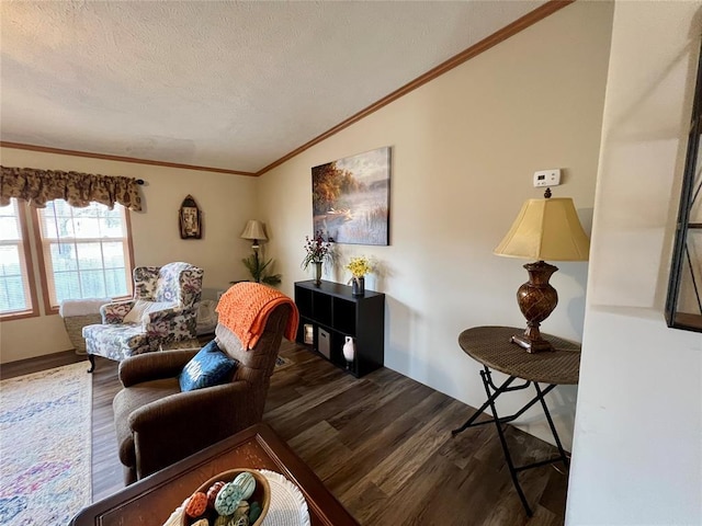 13132 Bluebird Ln, Kingston, OK 73439 - living room with lofted ceiling, ornamental molding, wood finished floors, and a textured ceiling