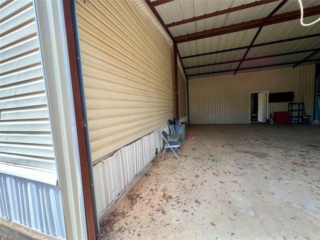 13132 Bluebird Ln, Kingston, OK 73439 - garage featuring an attached carport