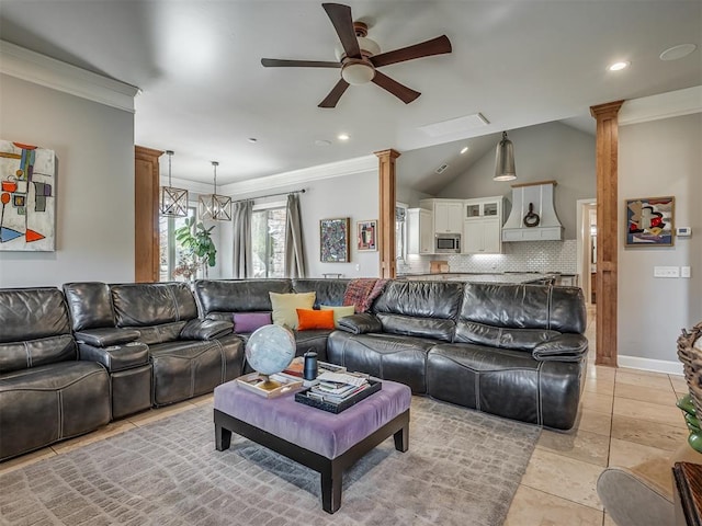 living room with baseboards, lofted ceiling, ornamental molding, ceiling fan with notable chandelier, and ornate columns