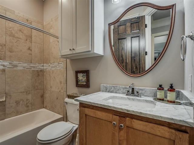 bathroom with toilet, shower / washtub combination, and vanity