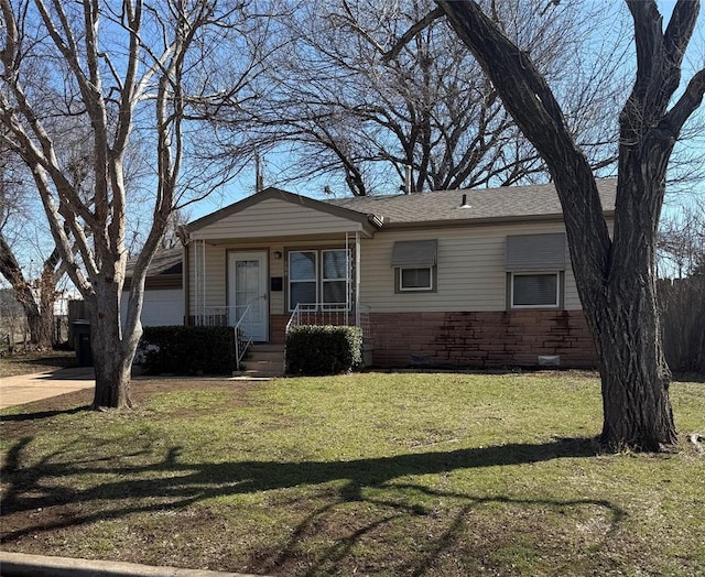 view of front of house featuring a garage, stone siding, roof with shingles, and a front lawn