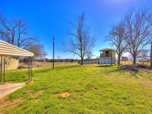 view of yard with fence