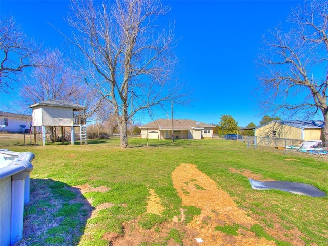 view of yard featuring fence