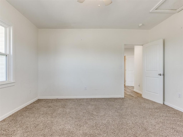37005 Lake Rd, Shawnee, OK 74801 - carpeted spare room featuring baseboards and a ceiling fan