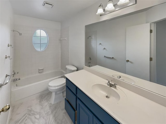 bathroom featuring visible vents, shower / washtub combination, toilet, and vanity