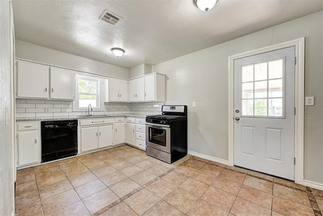 2625 SW 46th St, Oklahoma City, OK 73119 - kitchen featuring black dishwasher, stainless steel range with gas cooktop, a sink, backsplash, and white cabinets