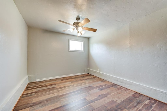 2625 SW 46th St, Oklahoma City, OK 73119 - spare room featuring light wood-style flooring, a ceiling fan, and baseboards