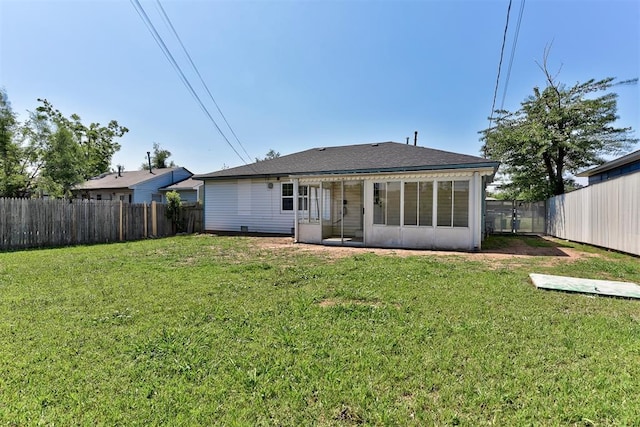 2625 SW 46th St, Oklahoma City, OK 73119 - back of property with a sunroom