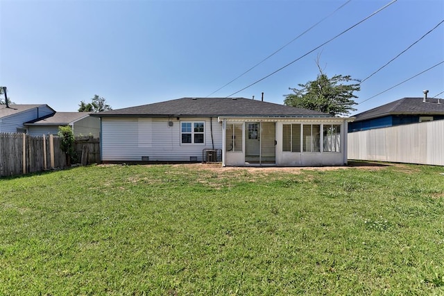 2625 SW 46th St, Oklahoma City, OK 73119 - rear view of house featuring a sunroom and central air condition unit