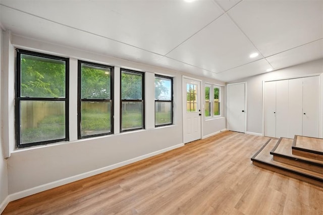 1731 Carlisle Rd, The Village, OK 73120 - unfurnished bedroom featuring baseboards, wood finished floors, recessed lighting, and a closet