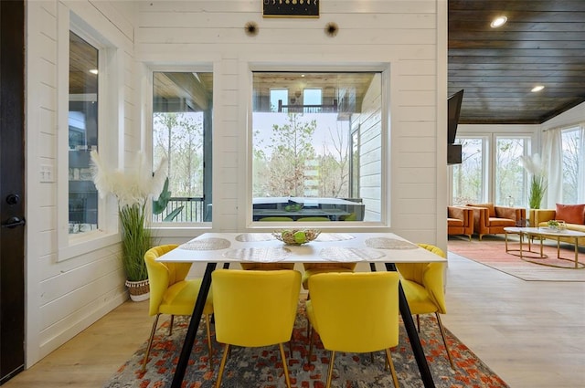 sunroom featuring wood ceiling