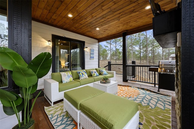 sunroom featuring wood ceiling