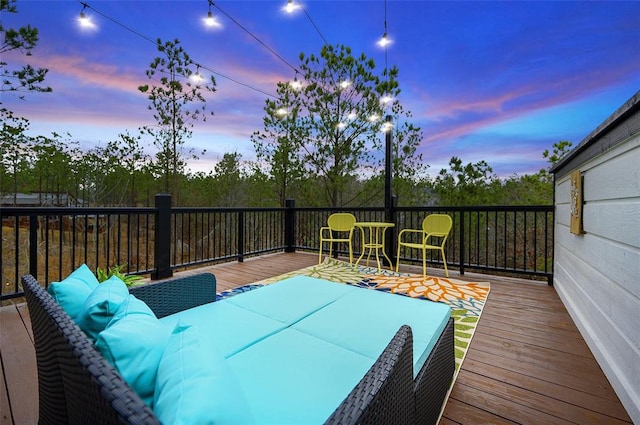 view of deck at dusk