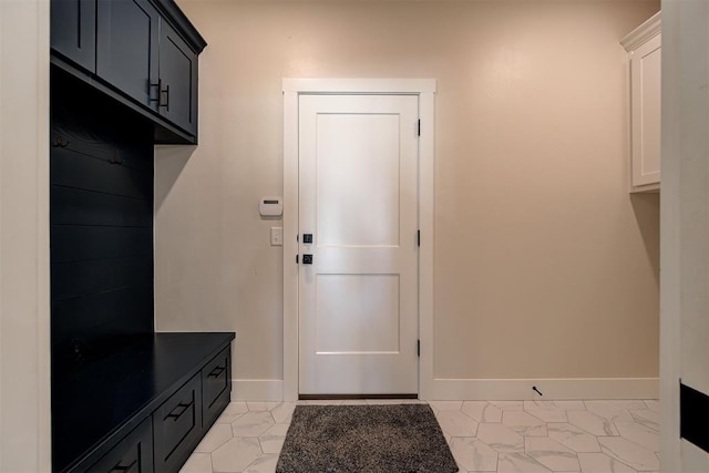 mudroom featuring baseboards