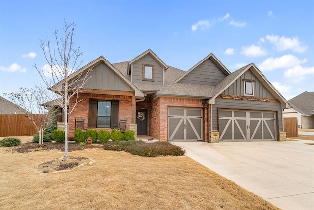 craftsman house with fence, roof with shingles, covered porch, concrete driveway, and a garage