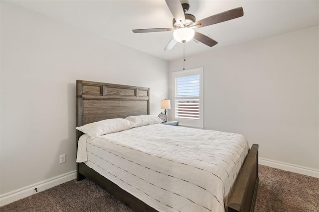 carpeted bedroom featuring baseboards and a ceiling fan