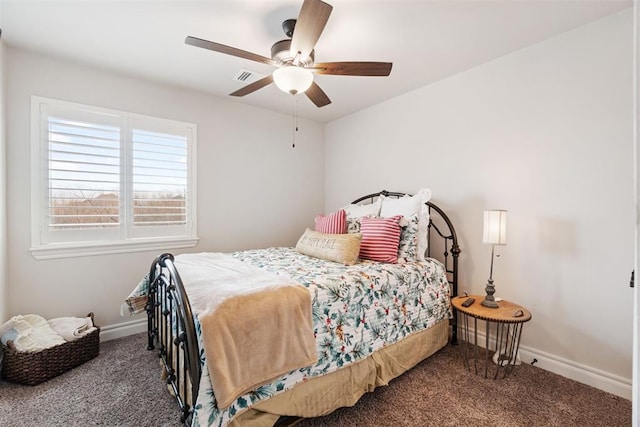 bedroom with a ceiling fan, visible vents, baseboards, and carpet floors