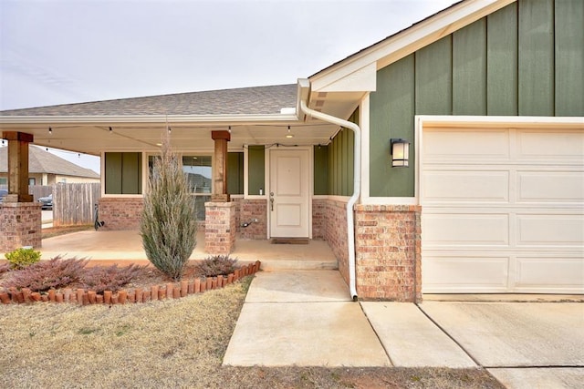 exterior space featuring brick siding, board and batten siding, a shingled roof, a porch, and a garage