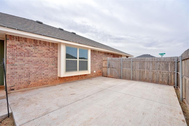 view of patio with fence