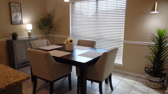 dining room with light tile patterned floors