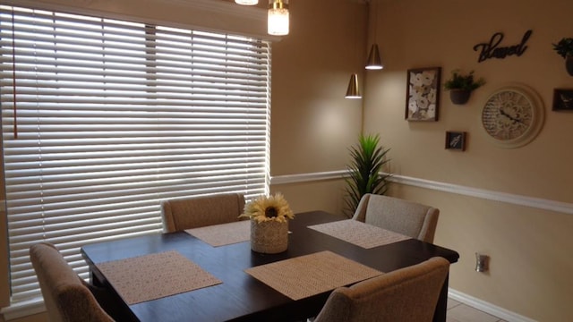 dining room with baseboards