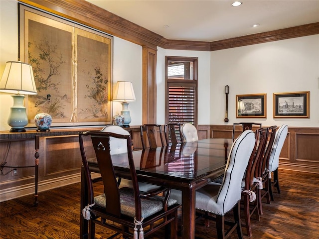 dining room with ornamental molding, dark wood-style floors, recessed lighting, and wainscoting