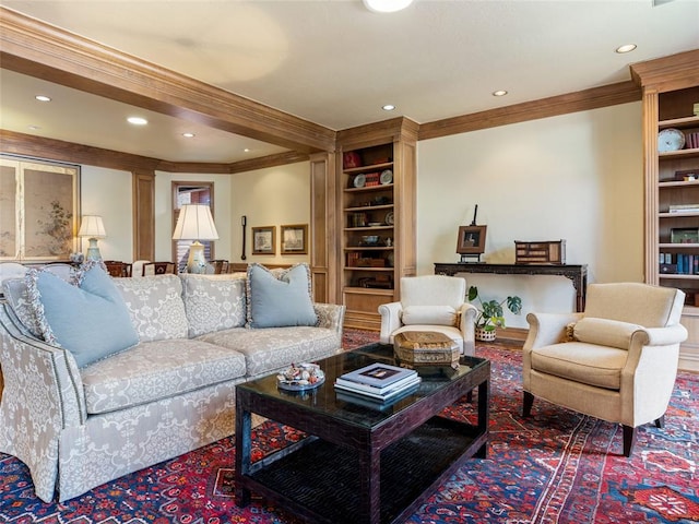 living area featuring recessed lighting, built in shelves, and crown molding