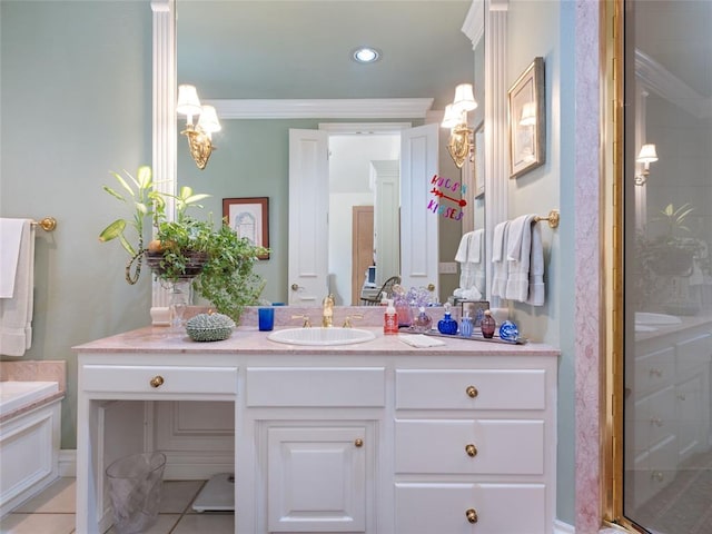 bathroom with vanity, ornamental molding, a shower stall, and tile patterned flooring