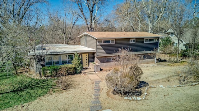 exterior space featuring brick siding