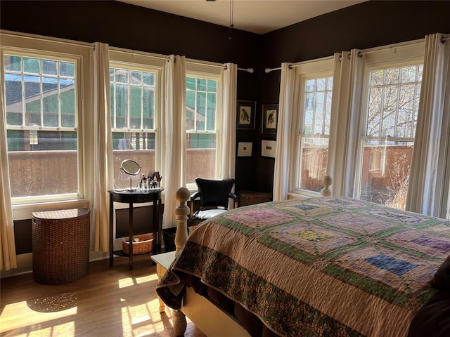 bedroom featuring wood finished floors