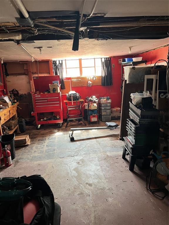 garage with a workshop area